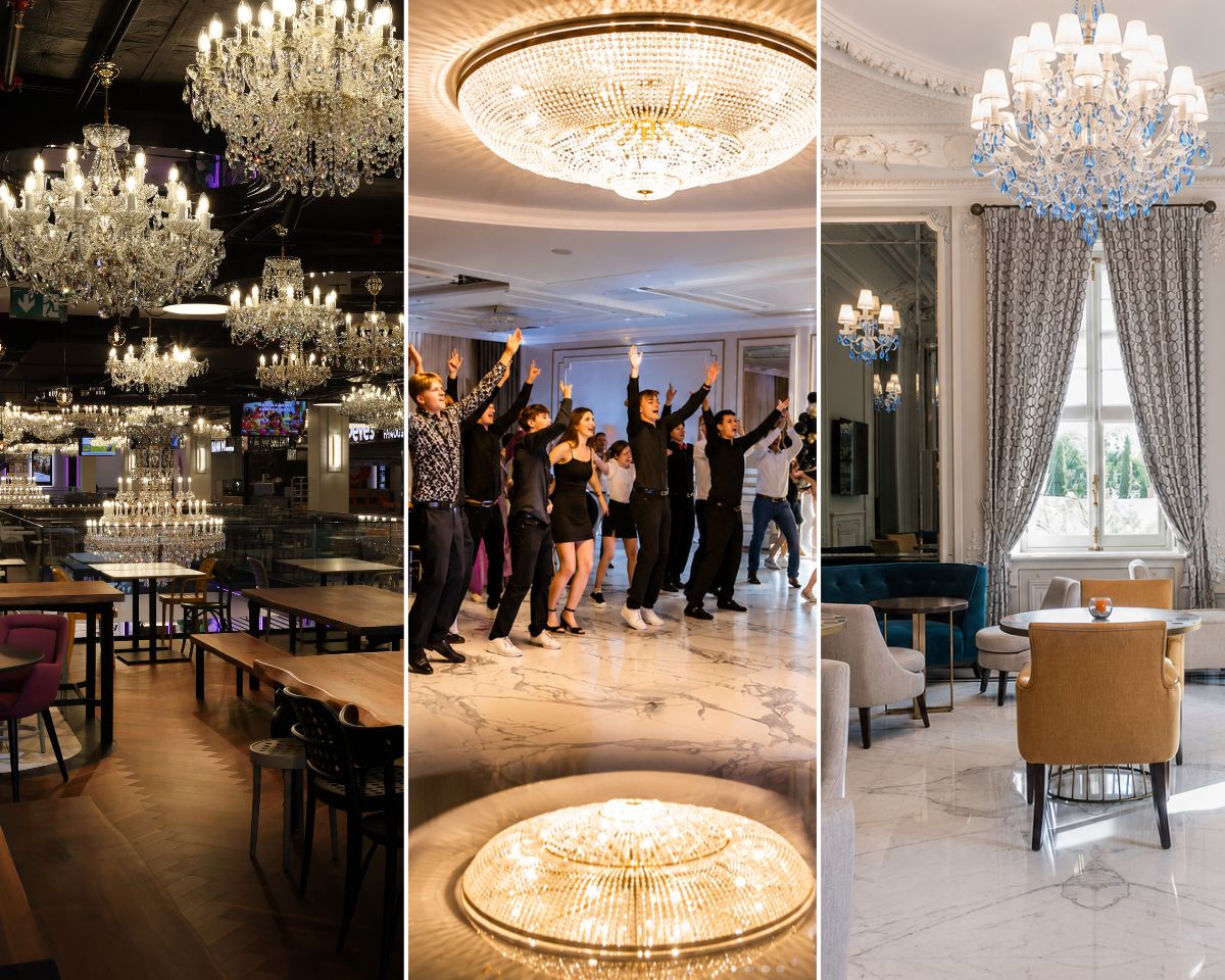 Wnętrze restauracji Bistro Bianco z dużym żyrandolem kryształowym odbijającym się w polerowanej marmurowej podłodze. Wnętrze hotelu Villa Genesis na Riwierze Francuskiej ze świetlnymi oprawami z niebieskich kryształów z widokiem na morze.