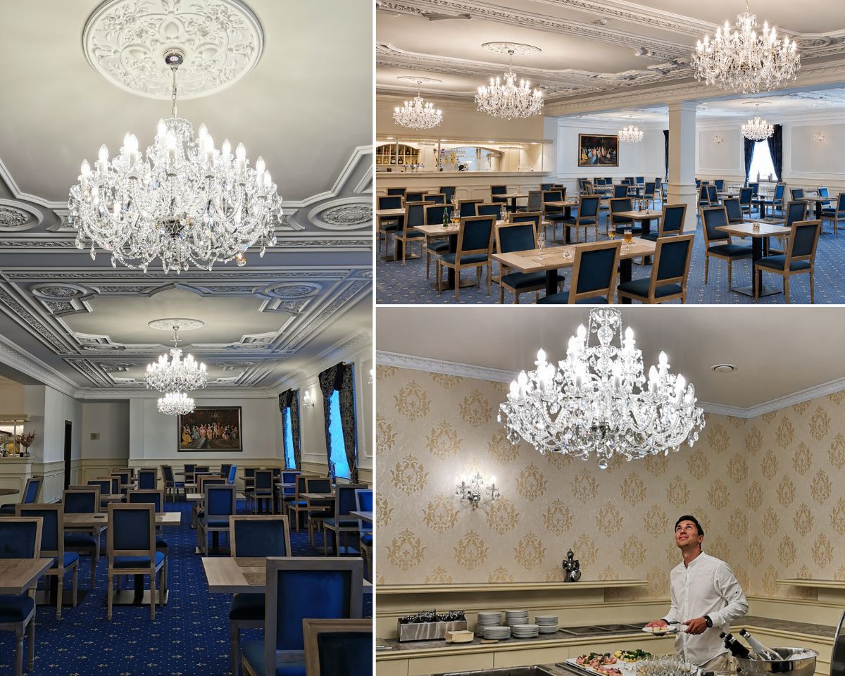 Restauracja zamkowego hotelu Chateau Šanov z wysokimi sztukateryjnymi sufitami i rzędem żyrandoli kryształowych z czeskiego szkła ciętego.